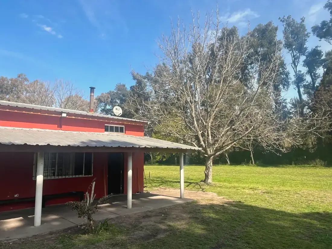 Galería de la casa, con vista al parque